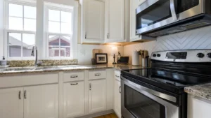 A stainless steel kitchen range with an oven below the cooktop